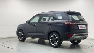 Used 2022 Hyundai Alcazar Platinum (O) 6 STR 2.0 Petrol AT Petrol Automatic exterior LEFT REAR CORNER VIEW