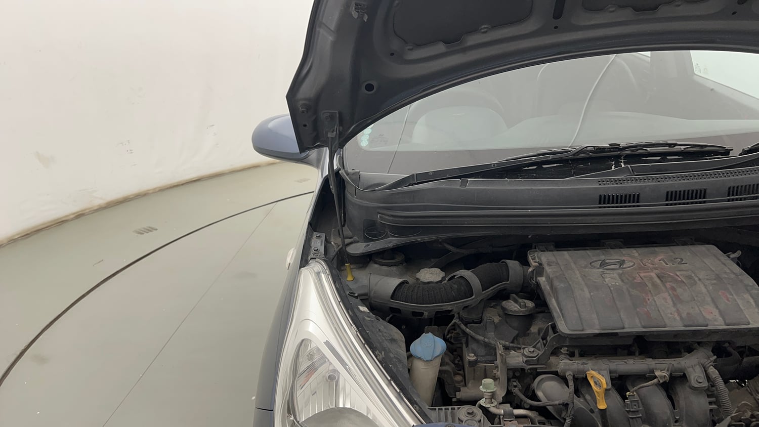 Used 2014 Hyundai Grand i10 Magna 1.2 Kappa VTVT Petrol Manual engine ENGINE RIGHT SIDE HINGE & APRON VIEW