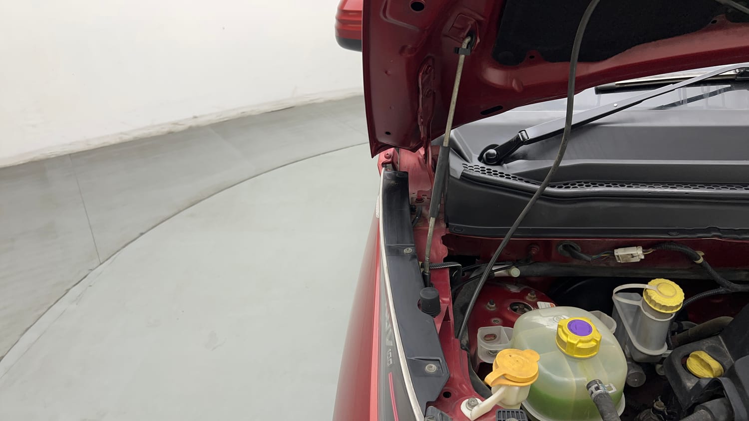 Used 2017 Mahindra KUV100 K4 Plus 6 STR Petrol Manual engine ENGINE RIGHT SIDE HINGE & APRON VIEW