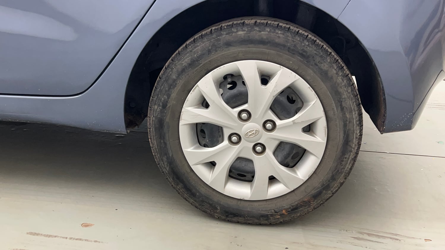 Used 2014 Hyundai Grand i10 Magna 1.2 Kappa VTVT Petrol Manual tyres LEFT REAR TYRE RIM VIEW