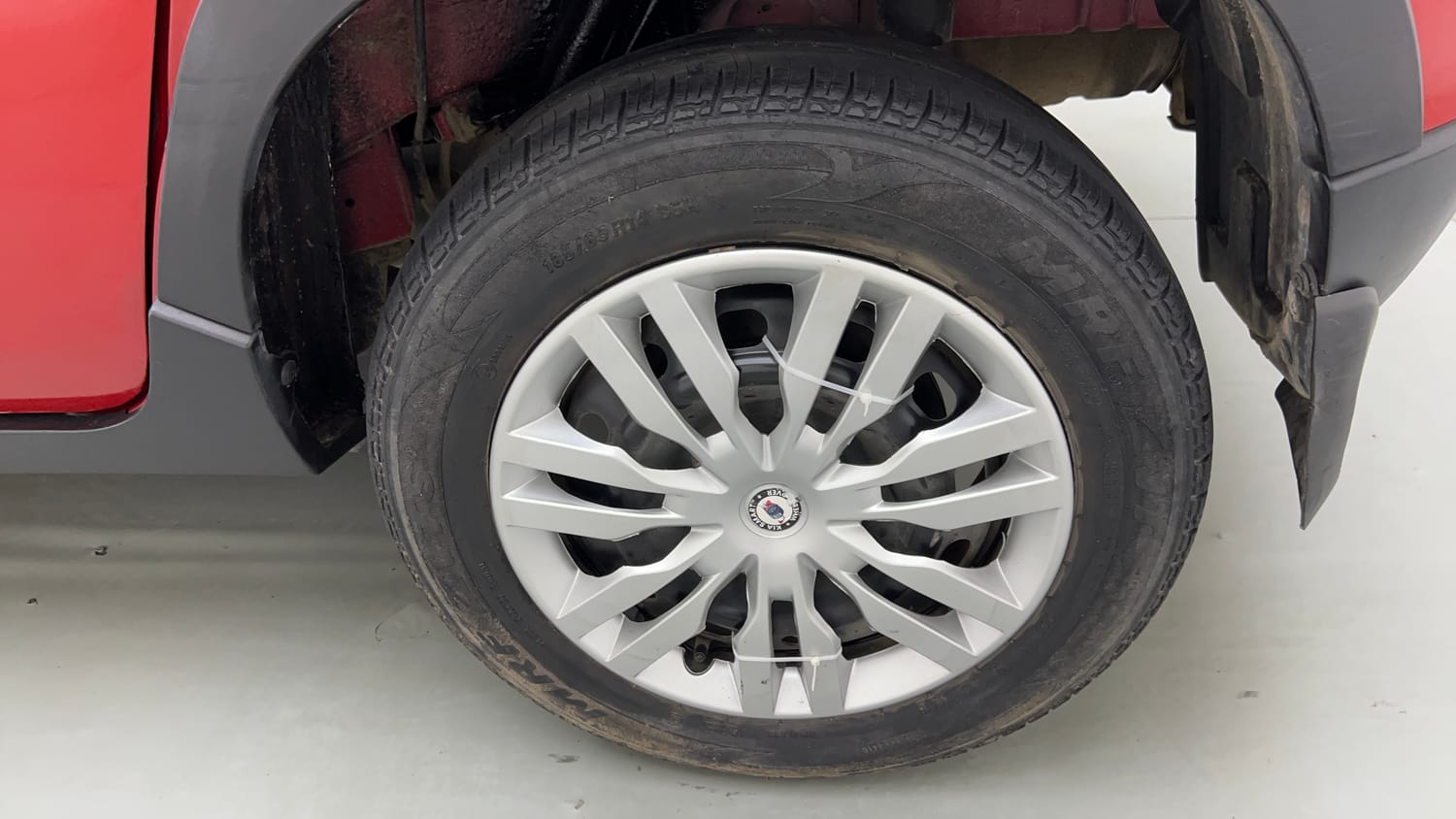 Used 2017 Mahindra KUV100 K4 Plus 6 STR Petrol Manual tyres LEFT REAR TYRE RIM VIEW