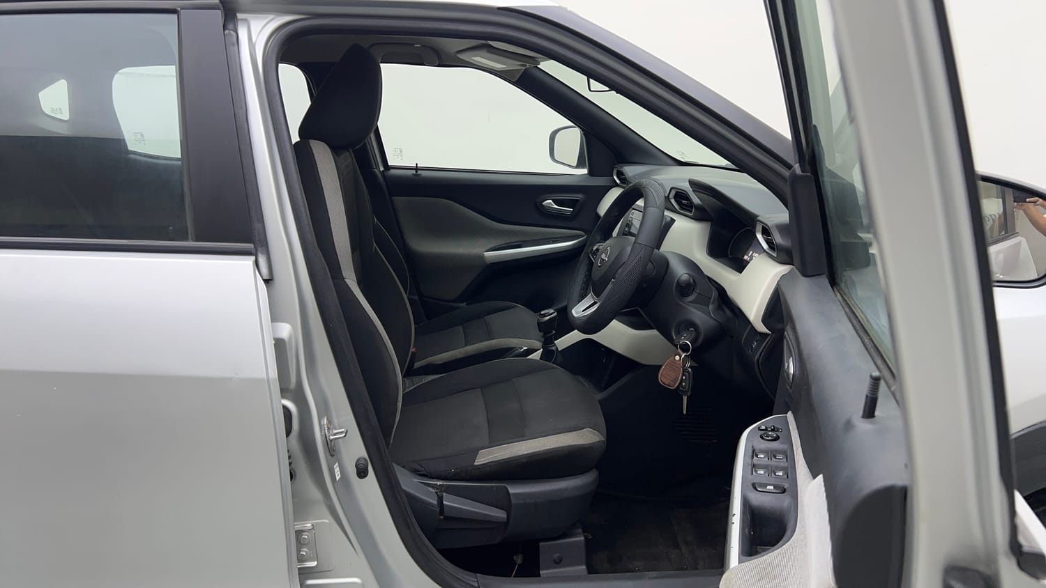Used 2022 Nissan Magnite XV Executive Petrol Manual interior RIGHT SIDE FRONT DOOR CABIN VIEW