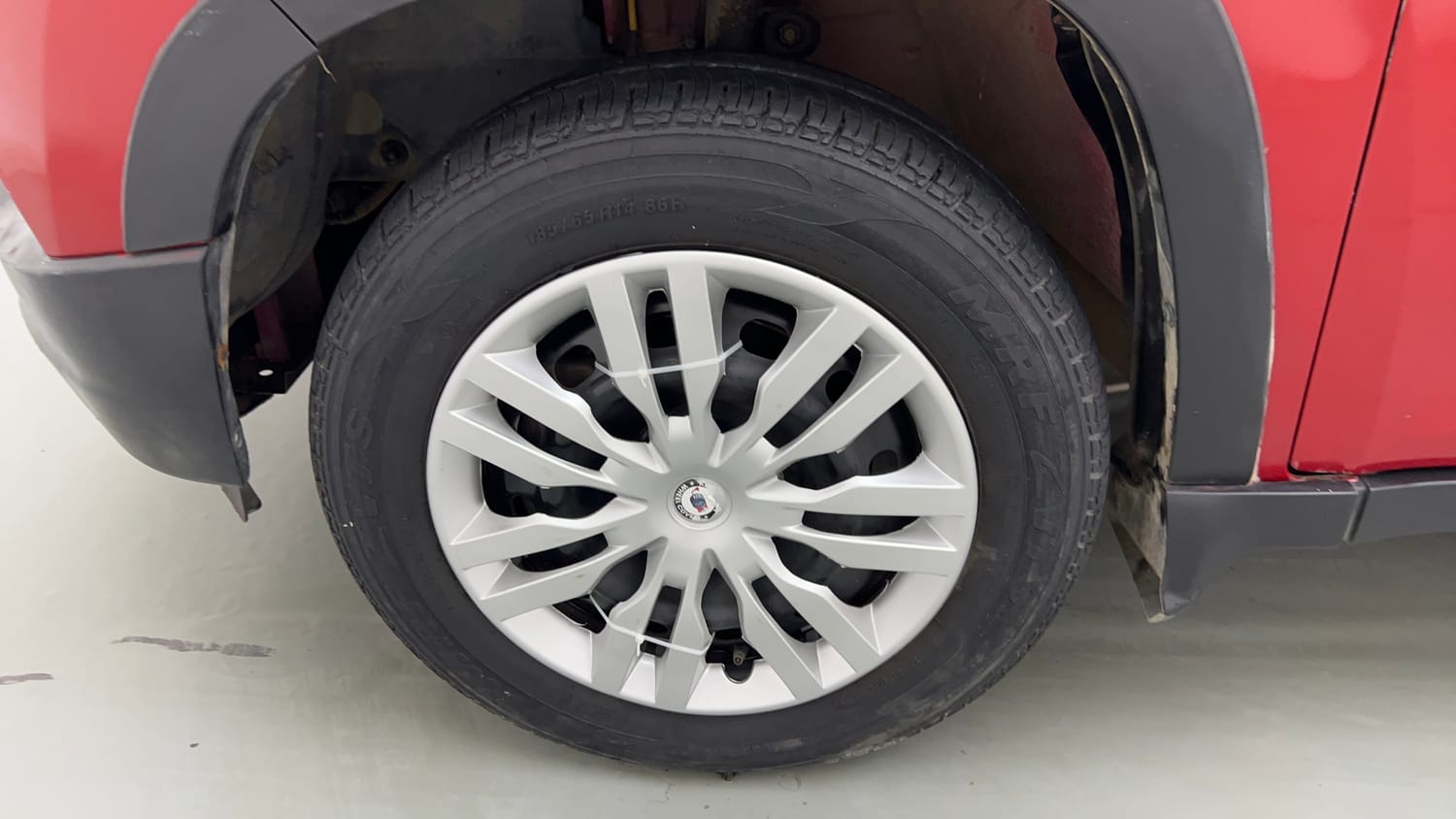 Used 2017 Mahindra KUV100 K4 Plus 6 STR Petrol Manual tyres LEFT FRONT TYRE RIM VIEW