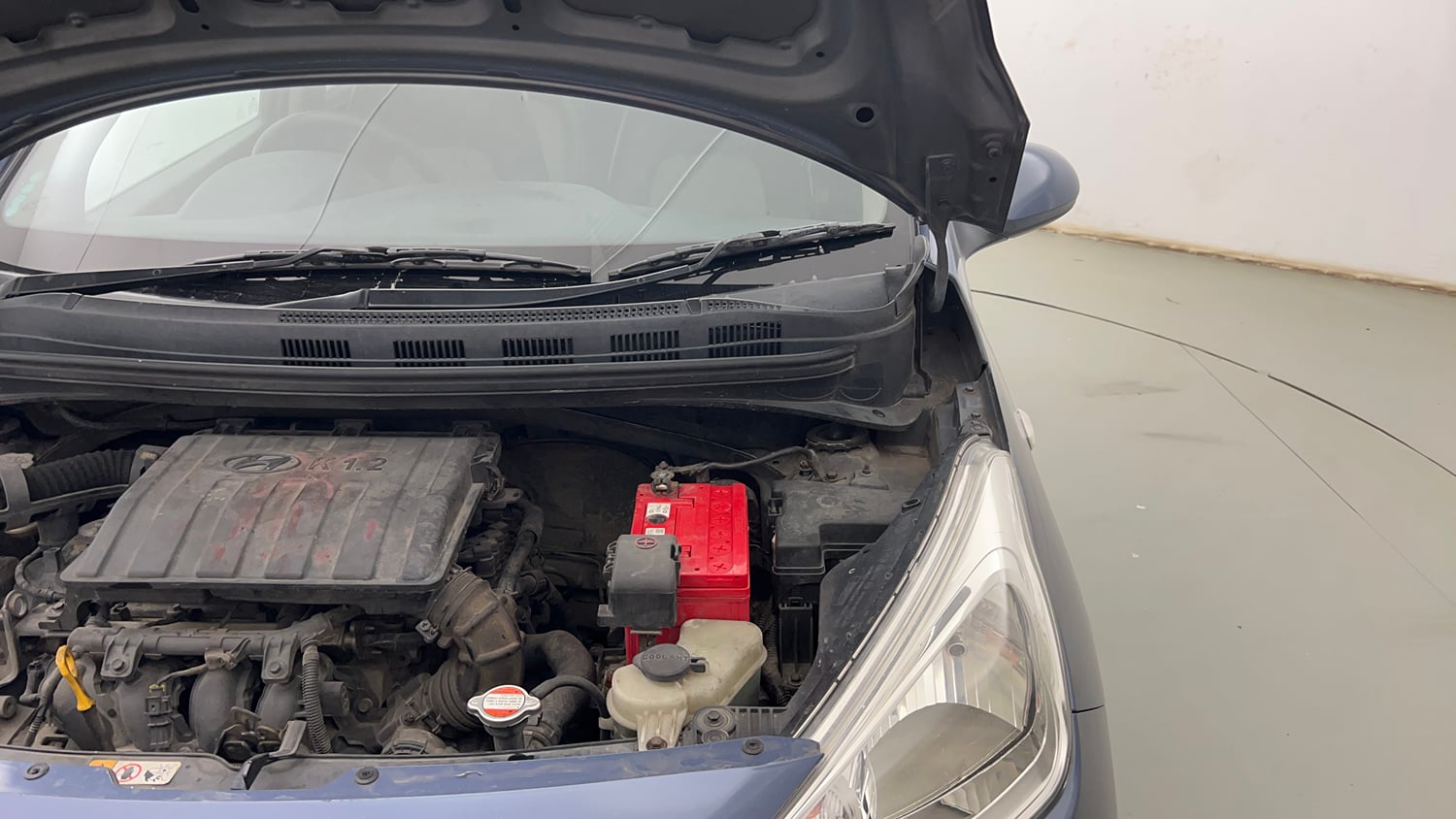 Used 2014 Hyundai Grand i10 Magna 1.2 Kappa VTVT Petrol Manual engine ENGINE LEFT SIDE HINGE & APRON VIEW