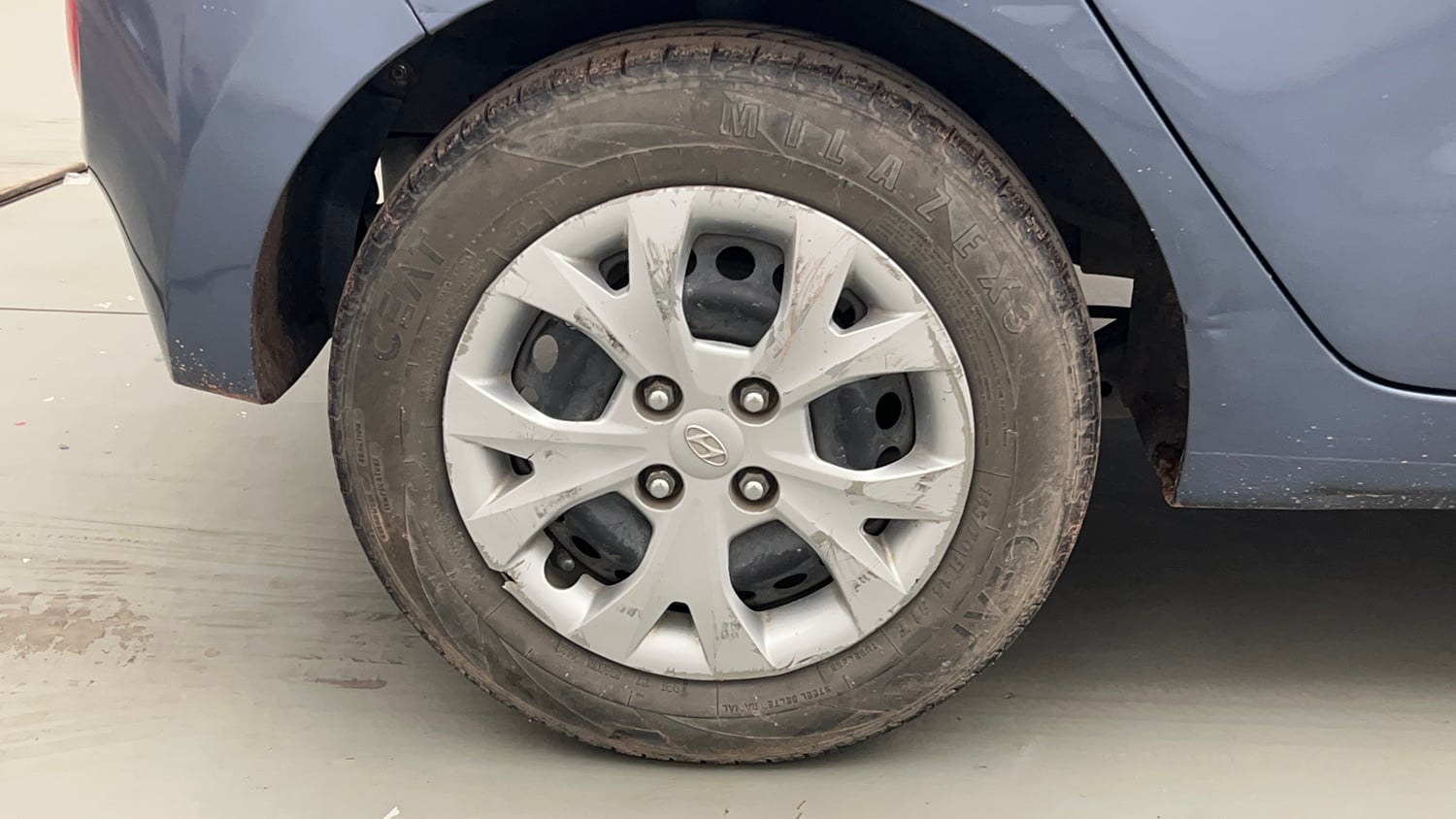 Used 2014 Hyundai Grand i10 Magna 1.2 Kappa VTVT Petrol Manual tyres RIGHT REAR TYRE RIM VIEW