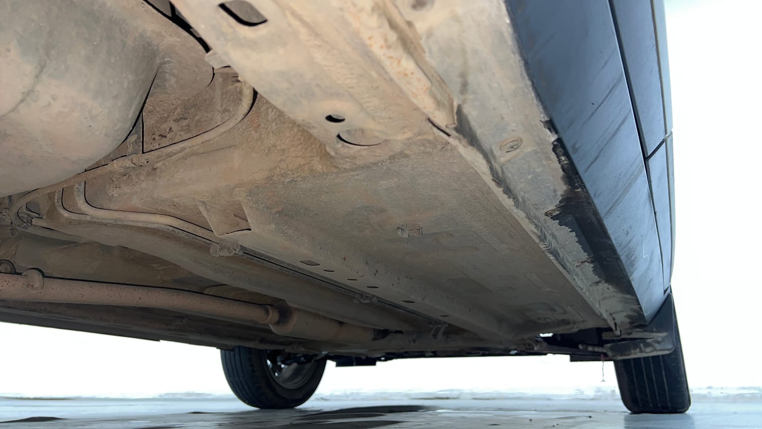 Used 2022 Nissan Magnite XV Executive Petrol Manual extra REAR RIGHT UNDERBODY VIEW
