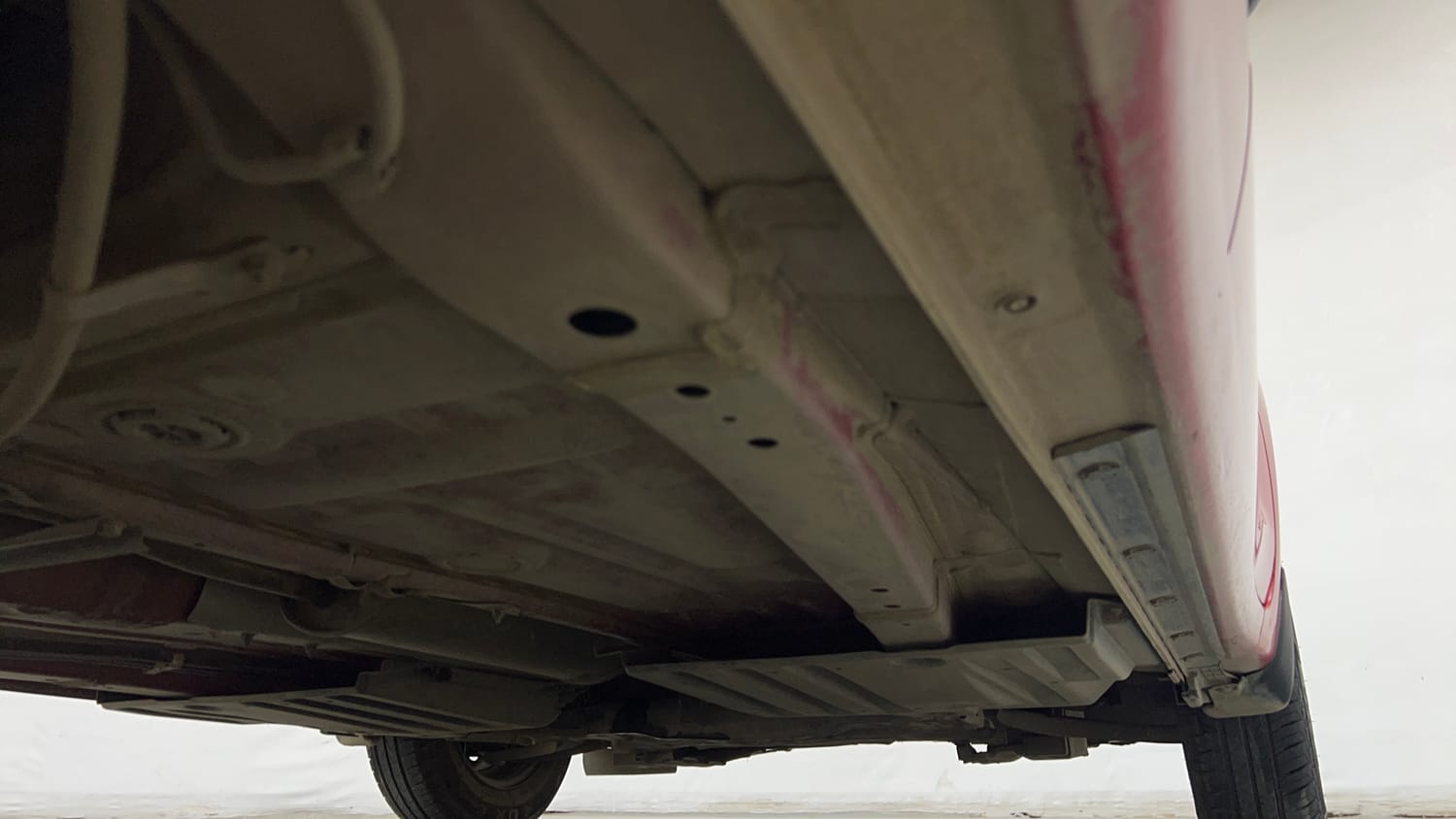 Used 2023 Maruti Suzuki Swift LXi Petrol Manual extra REAR RIGHT UNDERBODY VIEW