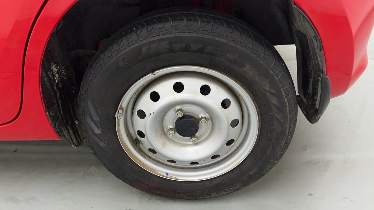 Used 2023 Maruti Suzuki Swift LXi Petrol Manual tyres LEFT REAR TYRE RIM VIEW