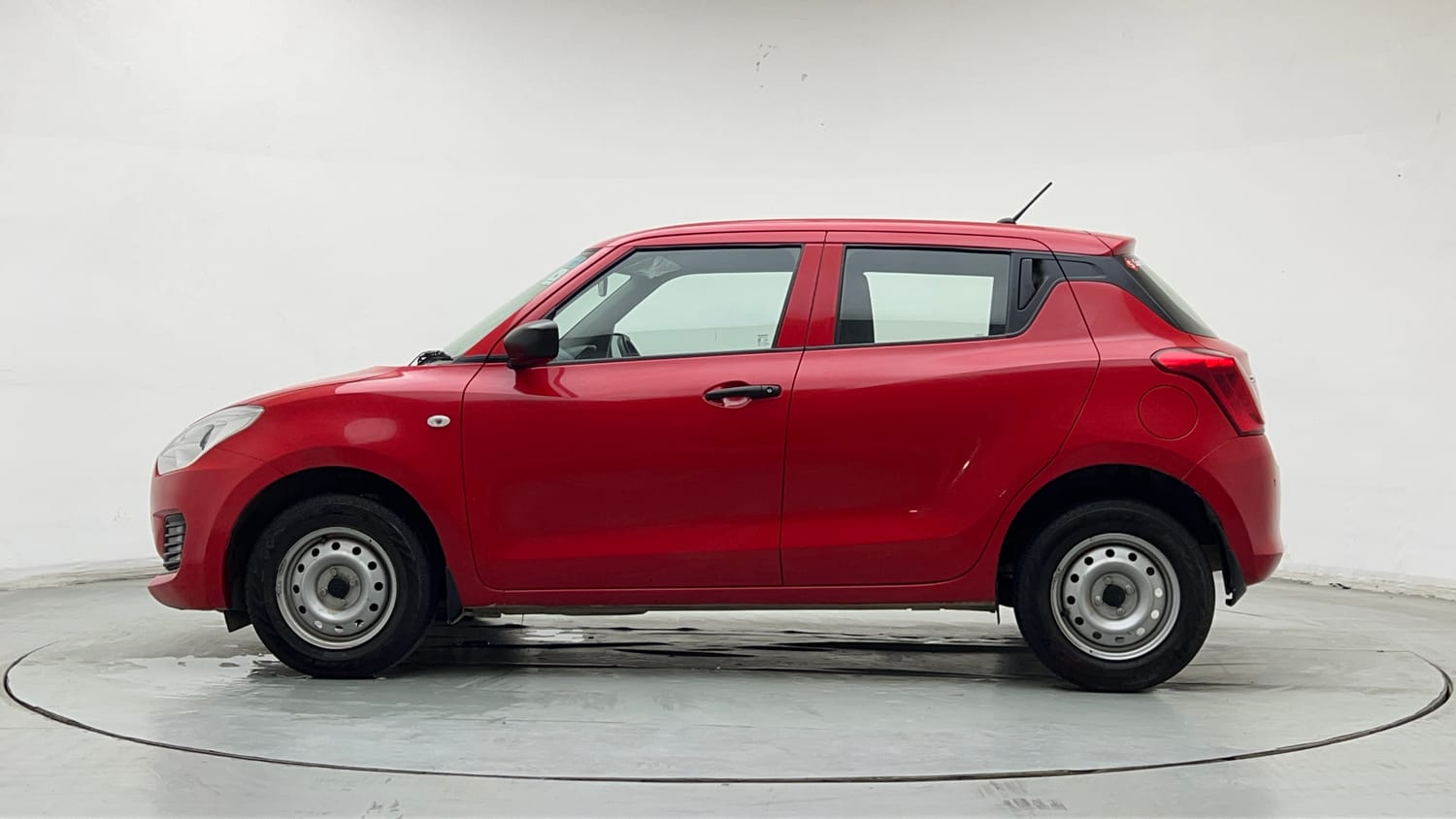 Used 2023 Maruti Suzuki Swift LXi Petrol Manual exterior LEFT SIDE VIEW