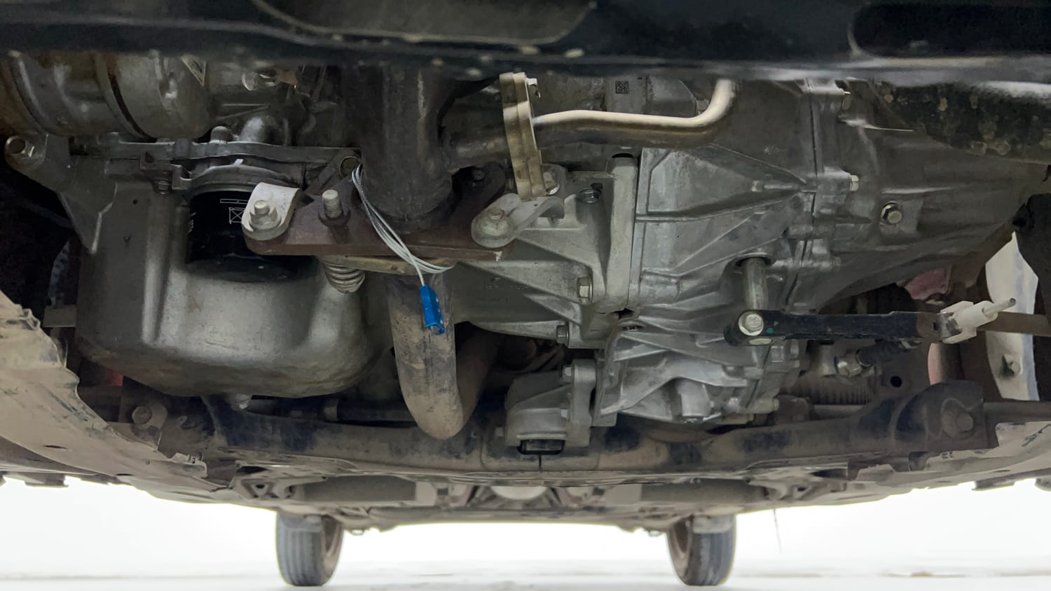 Used 2023 Maruti Suzuki Swift LXi Petrol Manual extra FRONT LEFT UNDERBODY VIEW