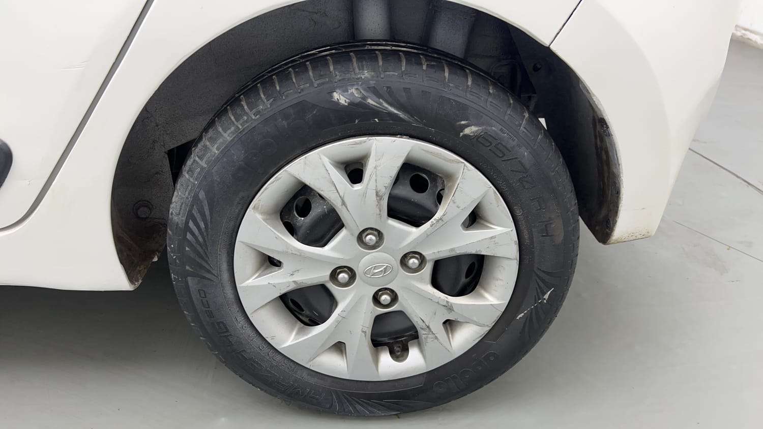 Used 2015 Hyundai Grand i10 Sportz 1.2 Kappa VTVT Petrol Manual tyres LEFT REAR TYRE RIM VIEW