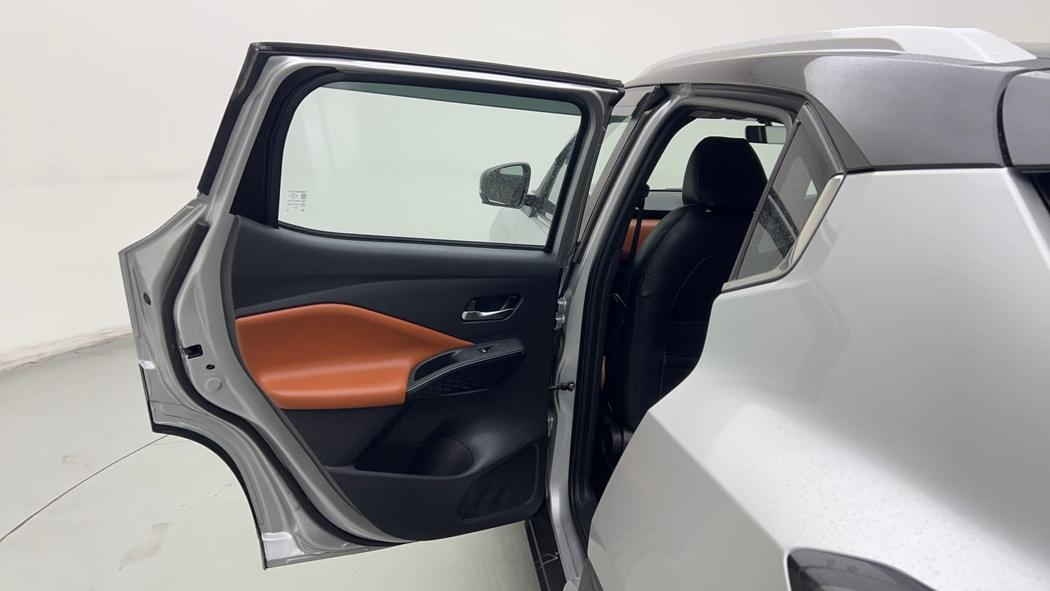 Used 2024 Nissan Magnite Tekna Plus B4D 1.0 Petrol AMT Dual Tone Petrol Automatic interior LEFT REAR DOOR OPEN VIEW