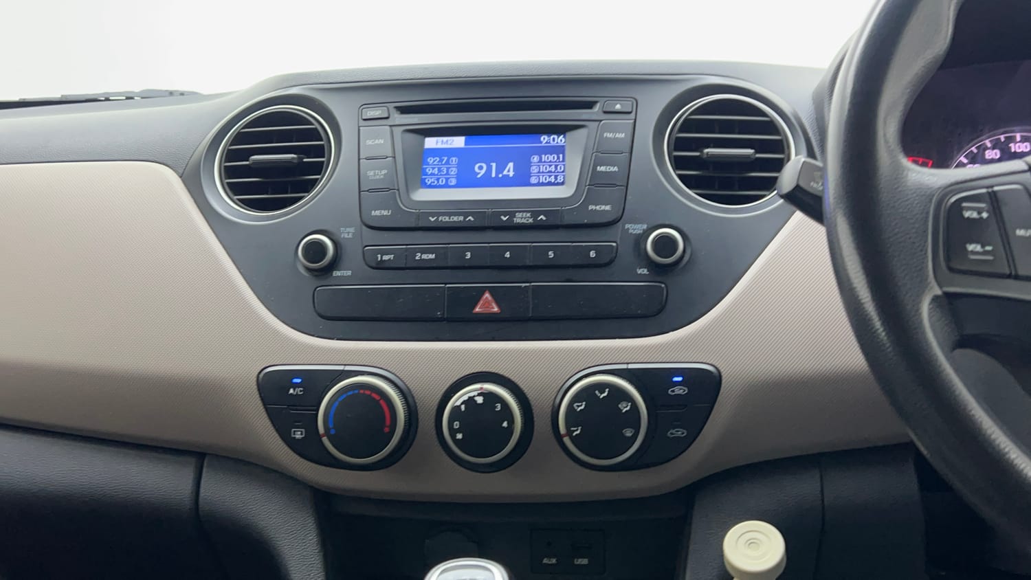 Used 2015 Hyundai Grand i10 Sportz 1.2 Kappa VTVT Petrol Manual interior MUSIC SYSTEM & AC CONTROL VIEW