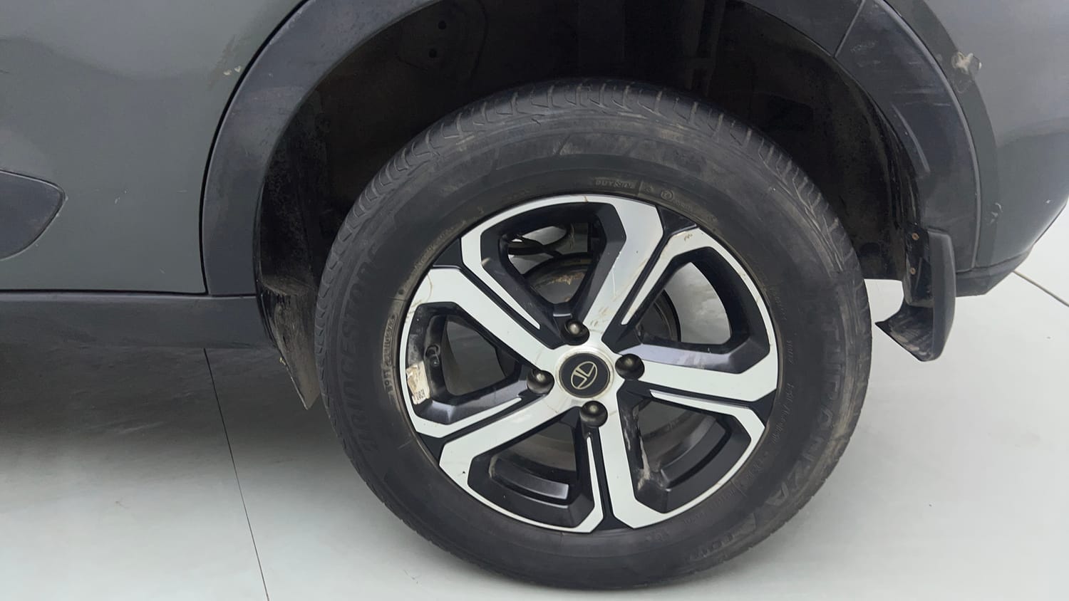 Used 2023 Tata Nexon XZ Plus Petrol Manual tyres LEFT REAR TYRE RIM VIEW