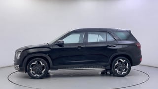 Used 2022 Hyundai Alcazar Signature (O) 6 STR 2.0 Petrol AT Petrol Automatic exterior LEFT SIDE VIEW