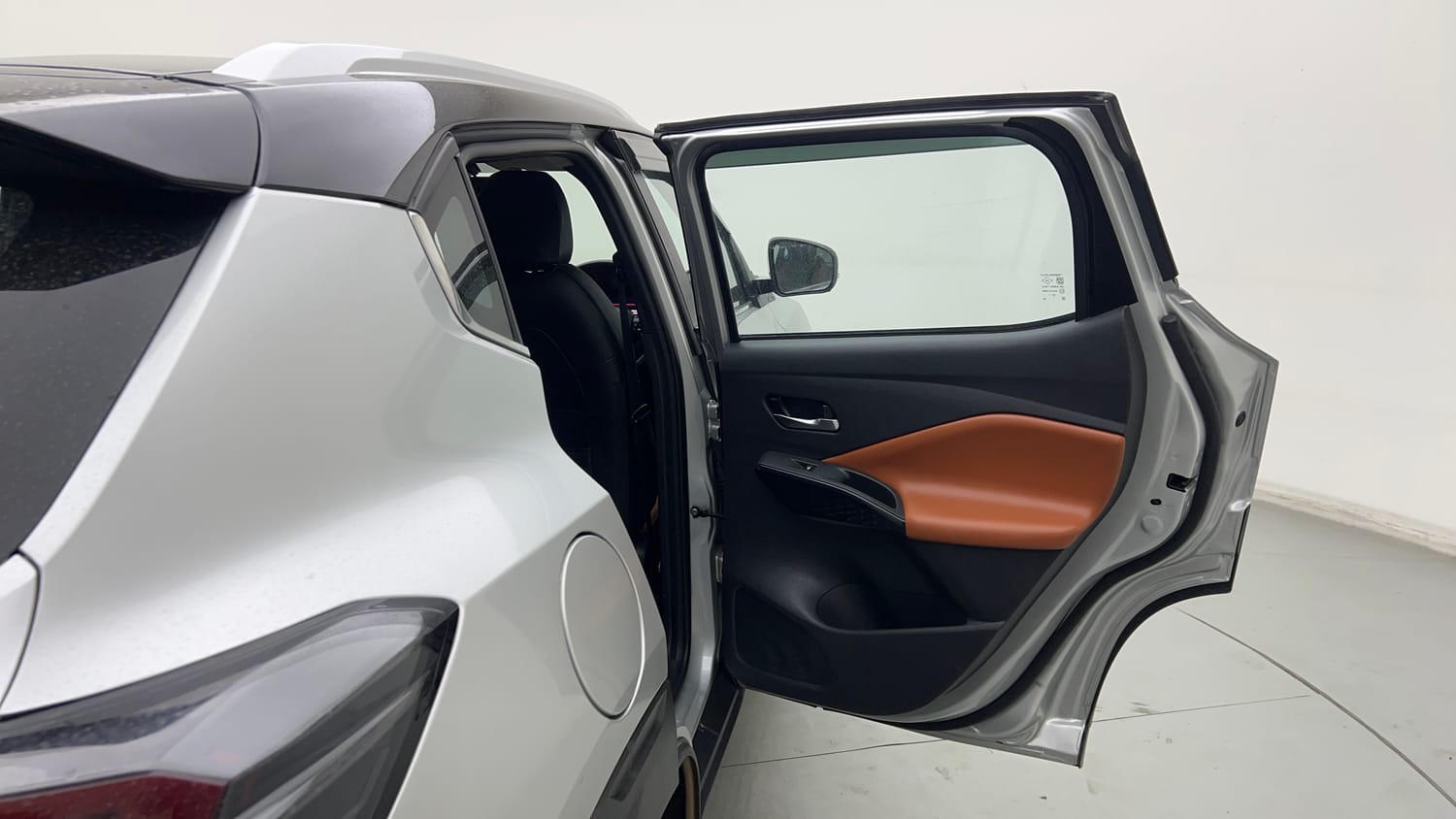 Used 2024 Nissan Magnite Tekna Plus B4D 1.0 Petrol AMT Dual Tone Petrol Automatic interior RIGHT REAR DOOR OPEN VIEW