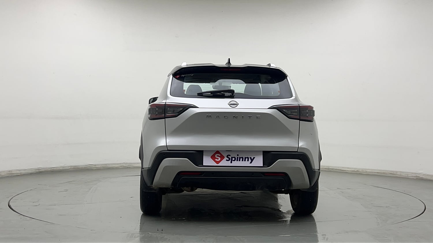 Used 2024 Nissan Magnite Tekna Plus B4D 1.0 Petrol AMT Dual Tone Petrol Automatic exterior BACK VIEW