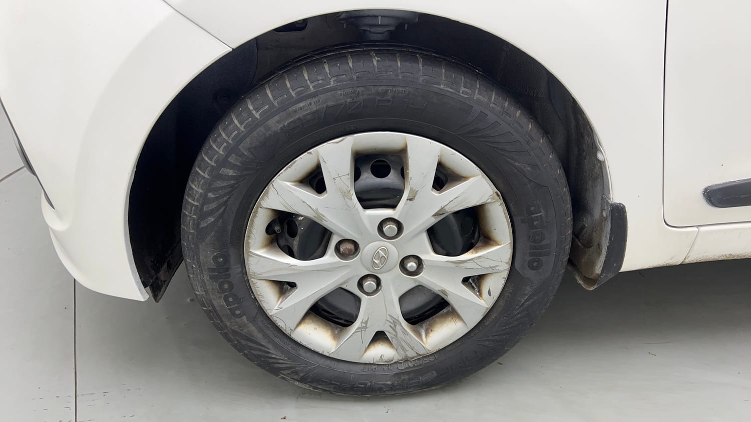 Used 2015 Hyundai Grand i10 Sportz 1.2 Kappa VTVT Petrol Manual tyres LEFT FRONT TYRE RIM VIEW