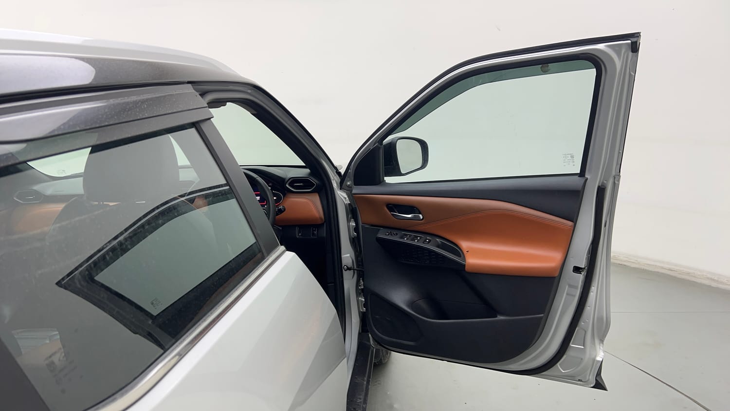 Used 2024 Nissan Magnite Tekna Plus B4D 1.0 Petrol AMT Dual Tone Petrol Automatic interior RIGHT FRONT DOOR OPEN VIEW