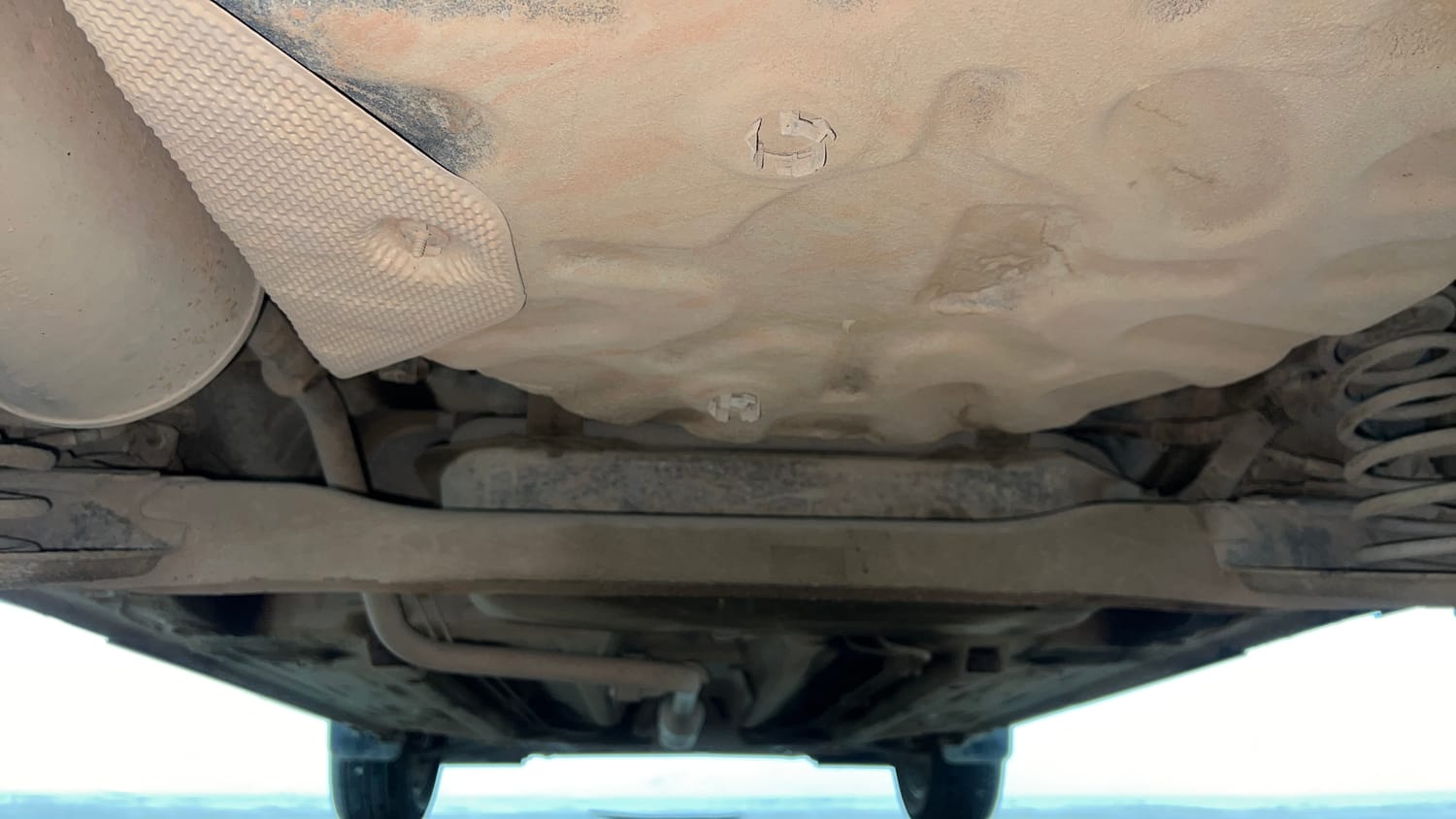 Used 2024 Nissan Magnite Tekna Plus B4D 1.0 Petrol AMT Dual Tone Petrol Automatic extra REAR UNDERBODY VIEW (TAKEN FROM REAR)