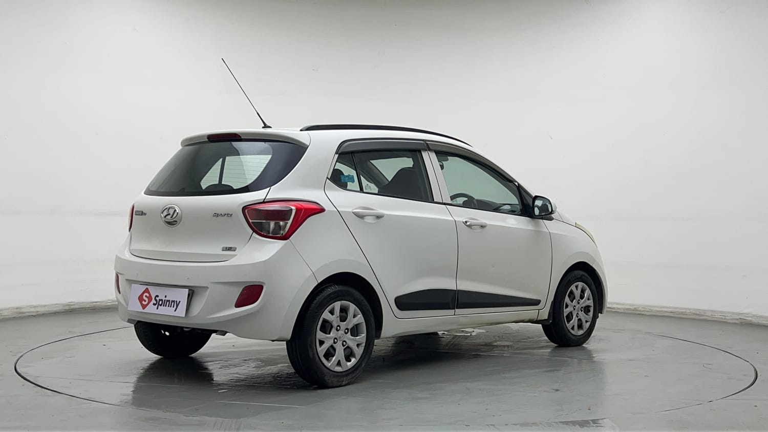 Used 2015 Hyundai Grand i10 Sportz 1.2 Kappa VTVT Petrol Manual exterior RIGHT REAR CORNER VIEW