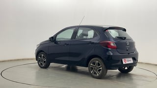 Used 2024 Tata Tiago XZ Plus Dual Tone Petrol Manual exterior LEFT REAR CORNER VIEW