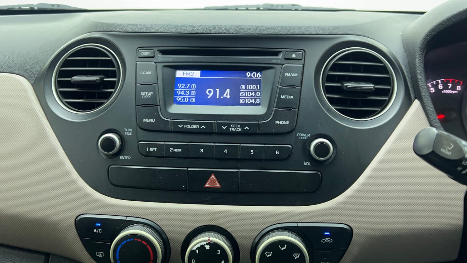Used 2015 Hyundai Grand i10 Sportz 1.2 Kappa VTVT Petrol Manual top_features Integrated (in-dash) music system