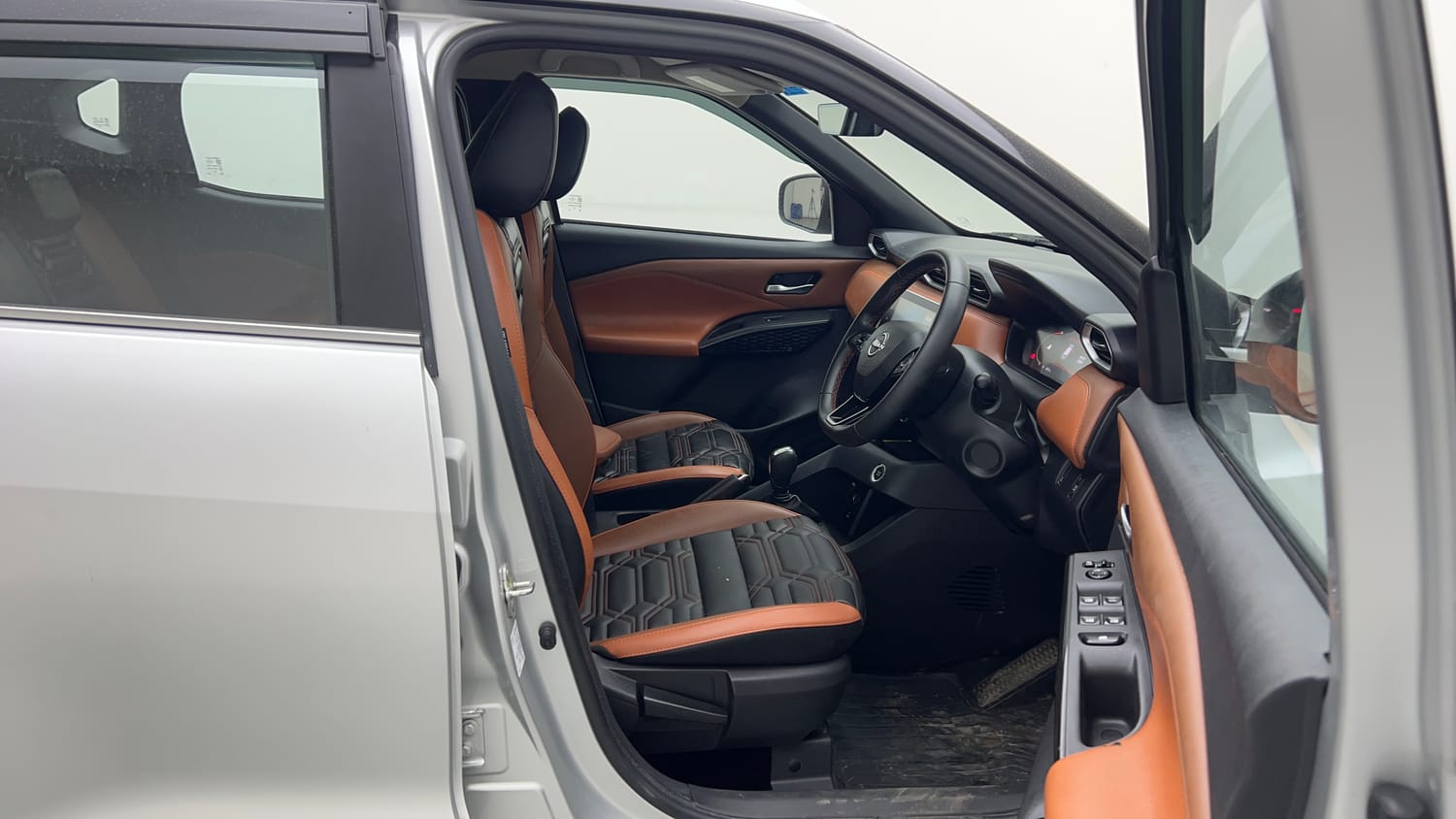 Used 2024 Nissan Magnite Tekna Plus B4D 1.0 Petrol AMT Dual Tone Petrol Automatic interior RIGHT SIDE FRONT DOOR CABIN VIEW