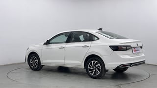 Used 2022 Volkswagen Virtus Topline 1.0 TSI AT Petrol Automatic exterior LEFT REAR CORNER VIEW