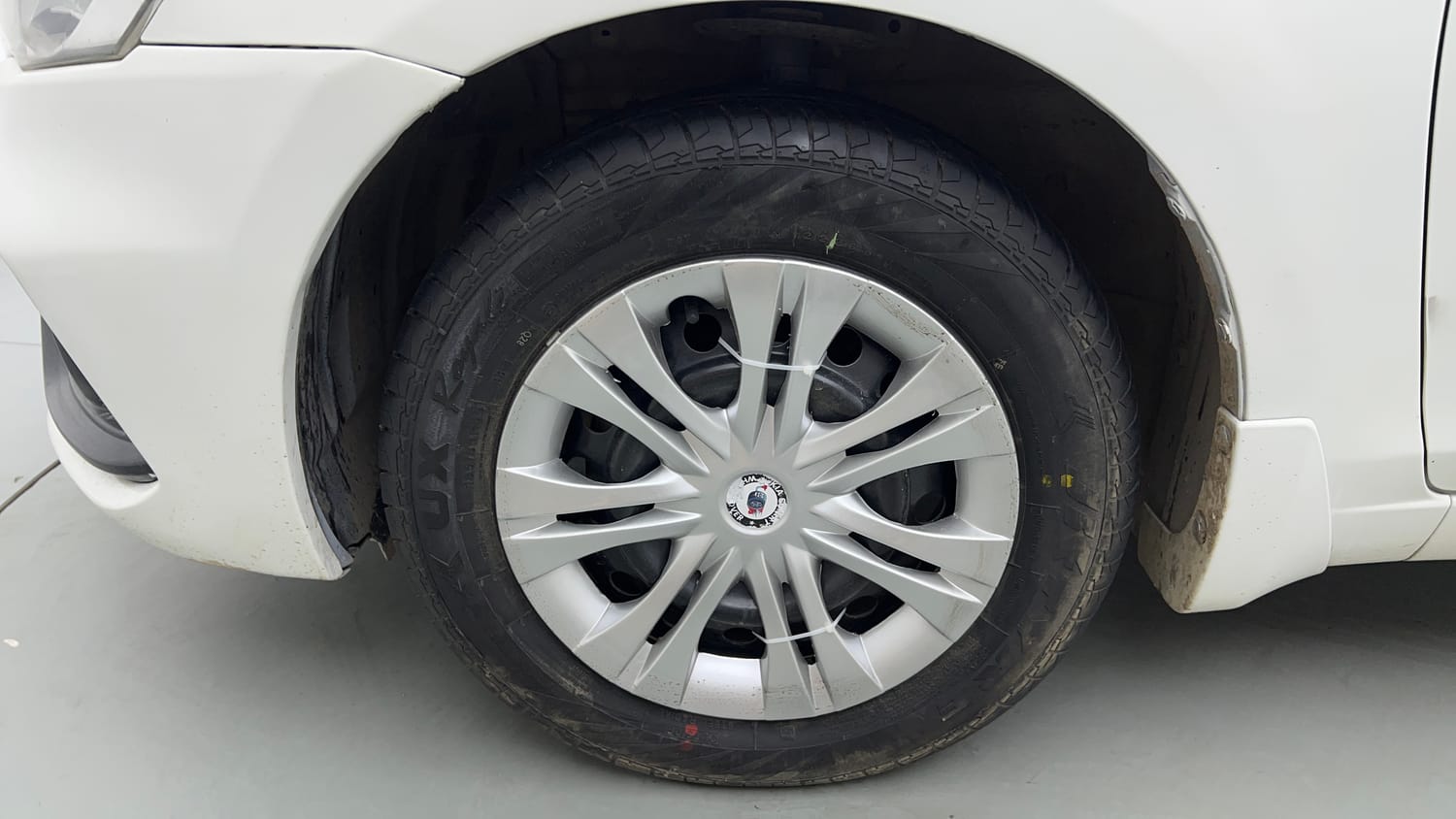 Used 2023 Maruti Suzuki Ciaz Sigma 1.5 Petrol Manual tyres LEFT FRONT TYRE RIM VIEW