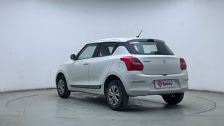Used 2021 Maruti Suzuki Swift VXi Petrol Manual exterior LEFT REAR CORNER VIEW