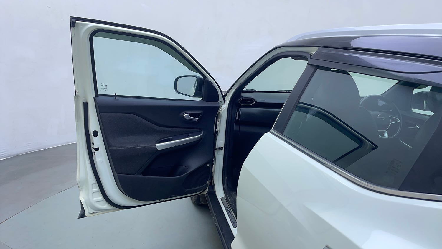 Used 2022 Nissan Magnite XV Premium Turbo CVT Dual Tone Petrol Automatic interior LEFT FRONT DOOR OPEN VIEW