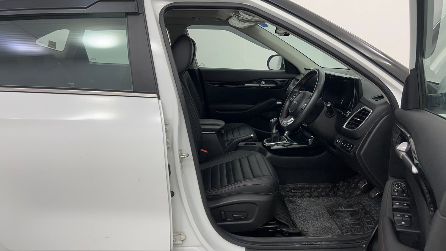 Used 2023 Kia Seltos GTX Plus 1.4 Petrol Manual interior RIGHT SIDE FRONT DOOR CABIN VIEW