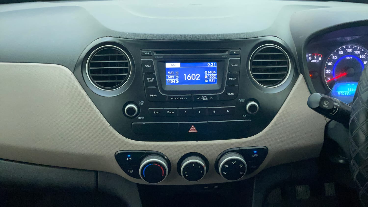 Used 2015 Hyundai Grand i10 Sportz 1.2 Kappa VTVT Petrol Manual interior MUSIC SYSTEM & AC CONTROL VIEW