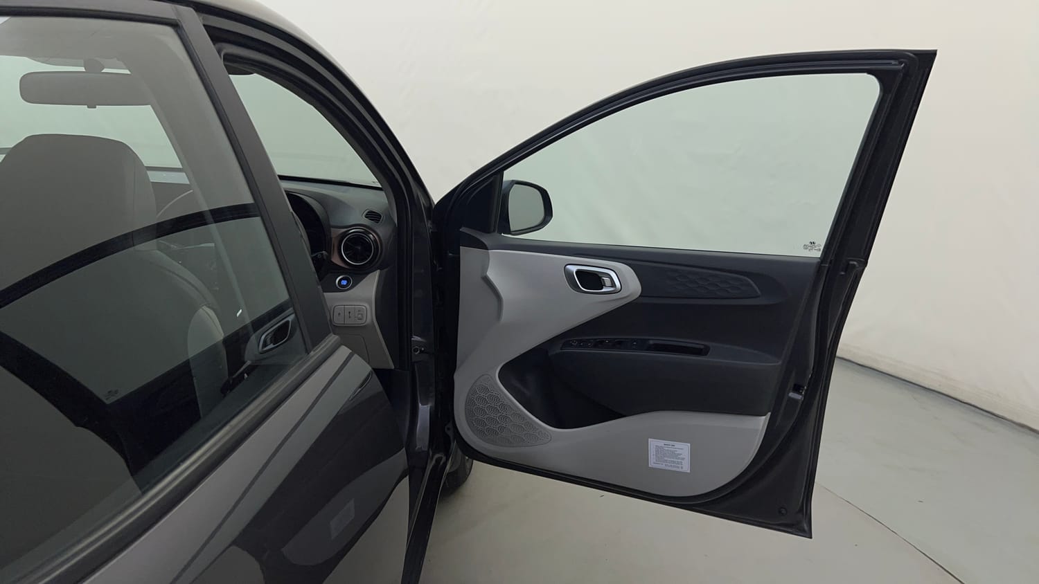 Used 2023 Hyundai Aura SX 1.2 CNG Cng Manual interior RIGHT FRONT DOOR OPEN VIEW