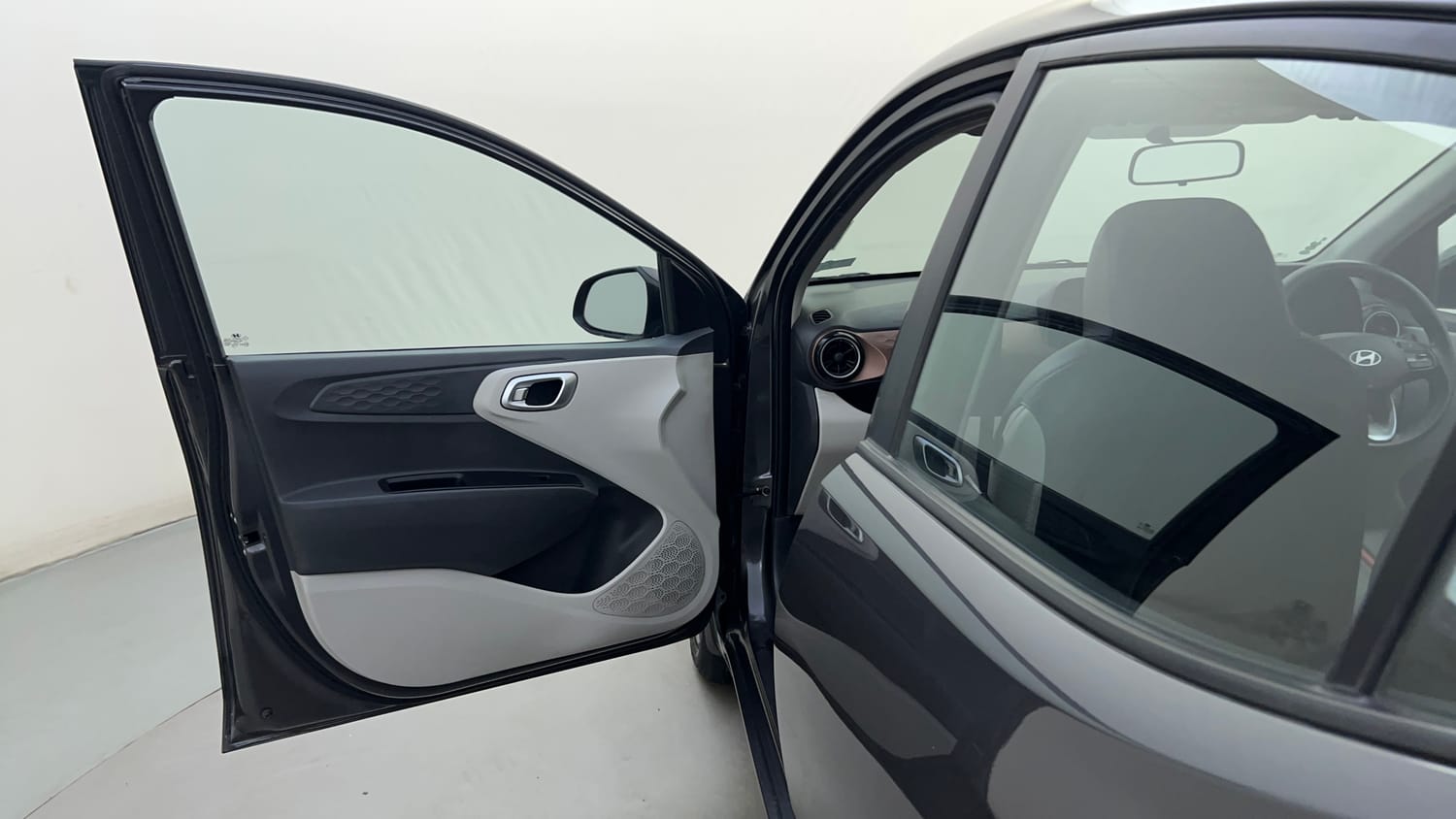 Used 2023 Hyundai Aura SX 1.2 CNG Cng Manual interior LEFT FRONT DOOR OPEN VIEW