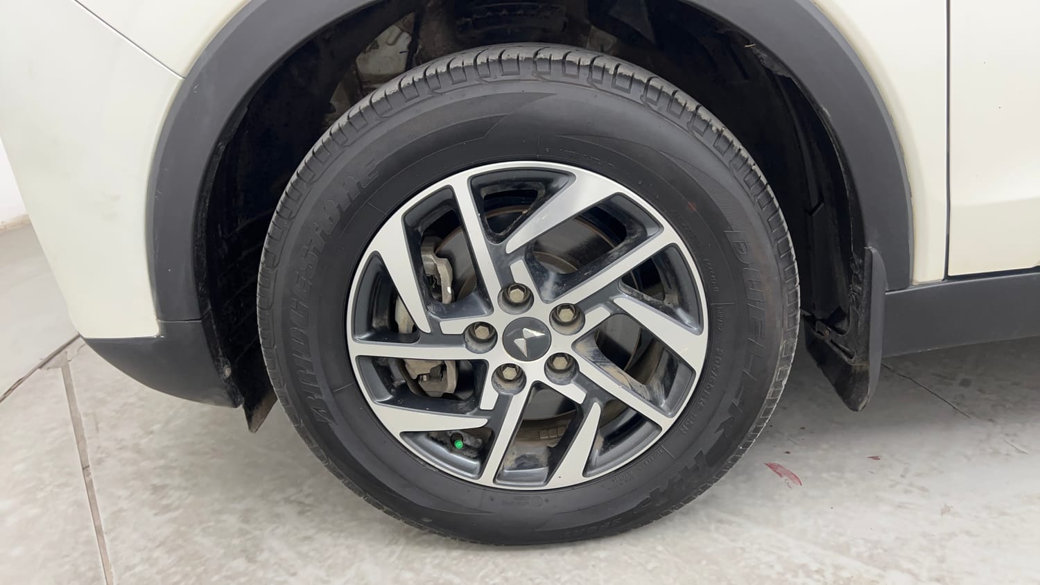 Used 2023 Mahindra XUV 300 W8 (O) 1.2 Petrol Petrol Manual tyres LEFT FRONT TYRE RIM VIEW