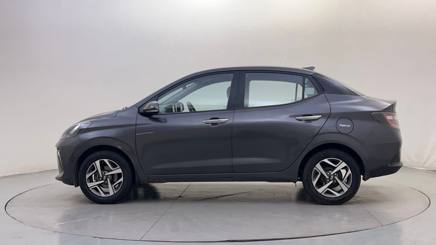 Used 2023 Hyundai Aura SX 1.2 CNG Cng Manual exterior LEFT SIDE VIEW