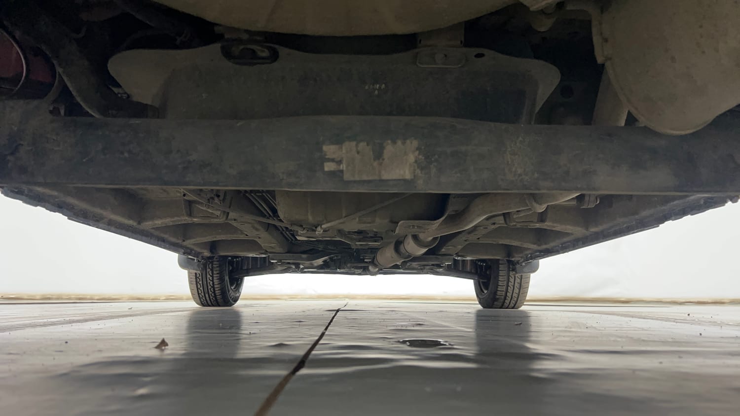 Used 2018 Mahindra KUV100 NXT K4 Plus 6 STR Petrol Manual extra REAR UNDERBODY VIEW (TAKEN FROM REAR)
