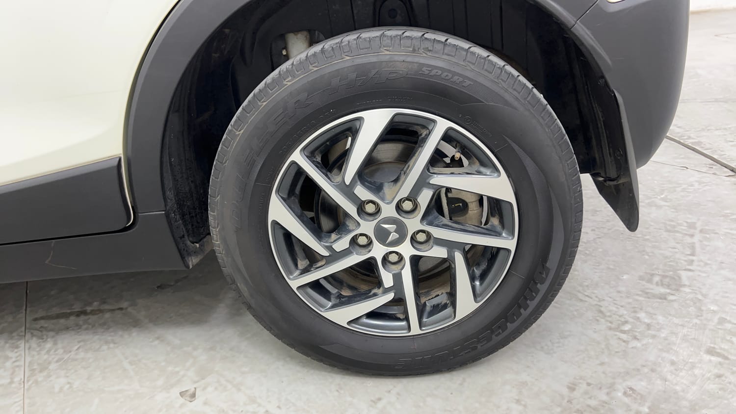 Used 2023 Mahindra XUV 300 W8 (O) 1.2 Petrol Petrol Manual tyres LEFT REAR TYRE RIM VIEW