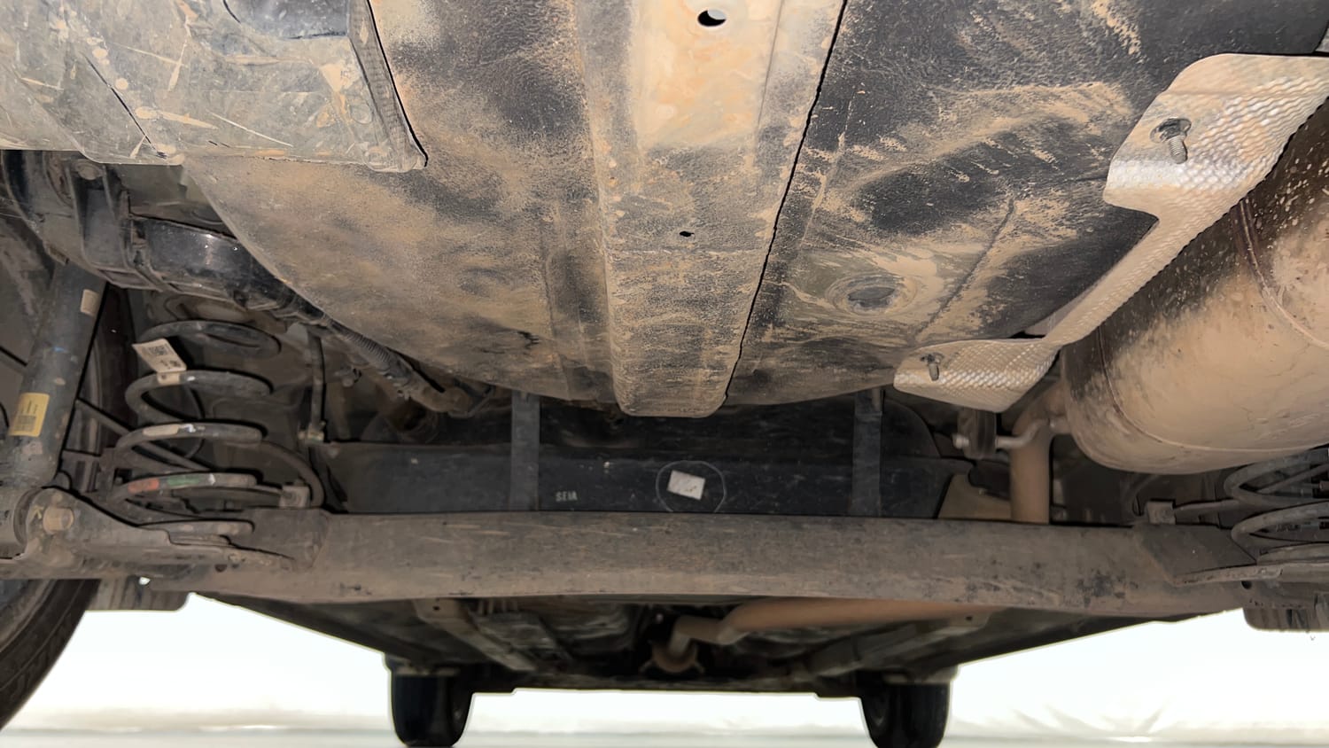 Used 2023 Hyundai Aura SX 1.2 CNG Cng Manual extra REAR UNDERBODY VIEW (TAKEN FROM REAR)
