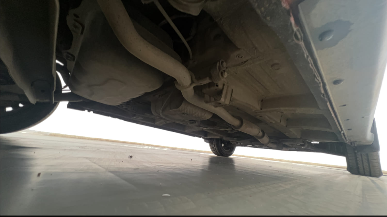 Used 2018 Mahindra KUV100 NXT K4 Plus 6 STR Petrol Manual extra REAR RIGHT UNDERBODY VIEW