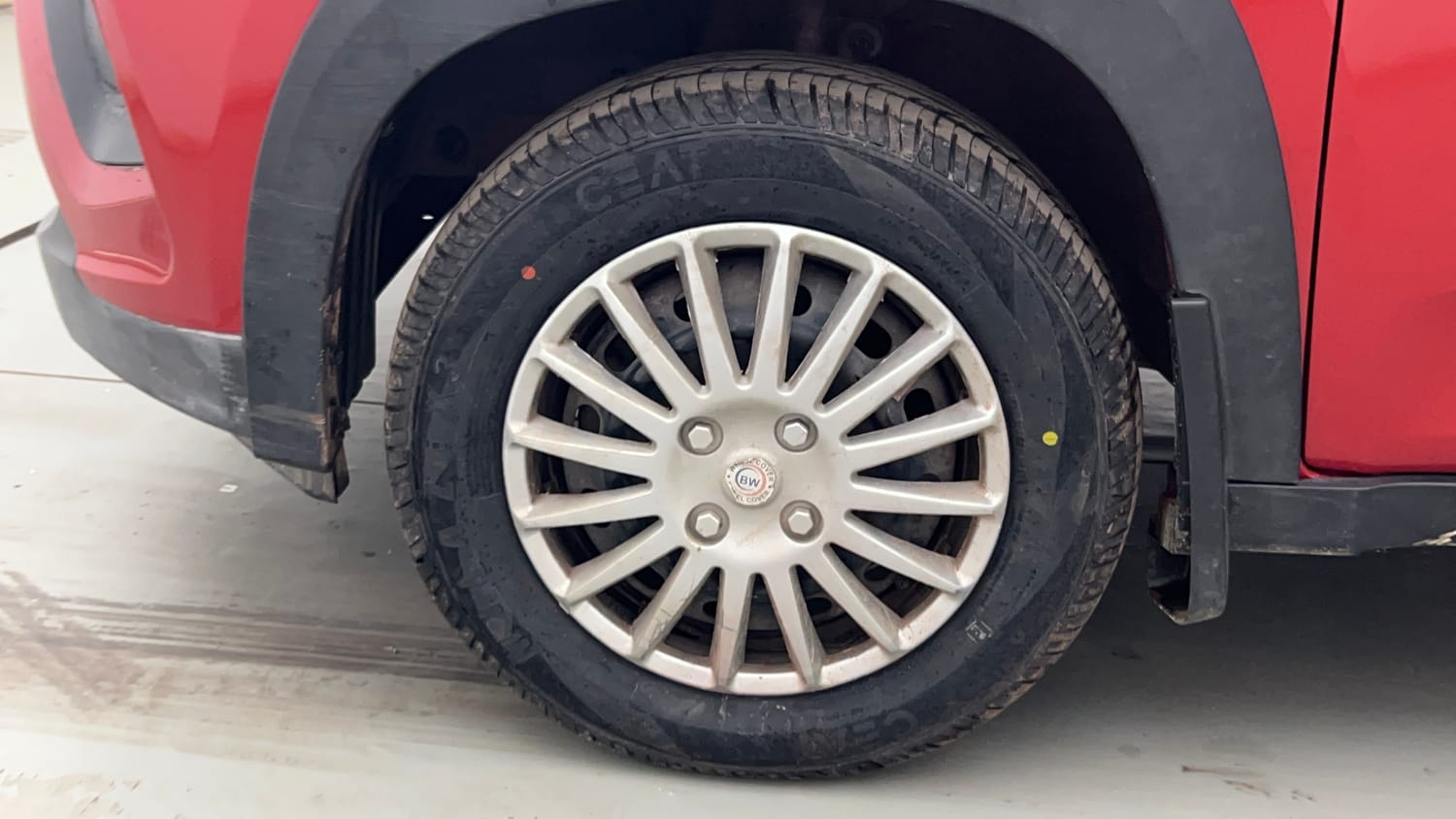 Used 2018 Mahindra KUV100 NXT K4 Plus 6 STR Petrol Manual tyres LEFT FRONT TYRE RIM VIEW