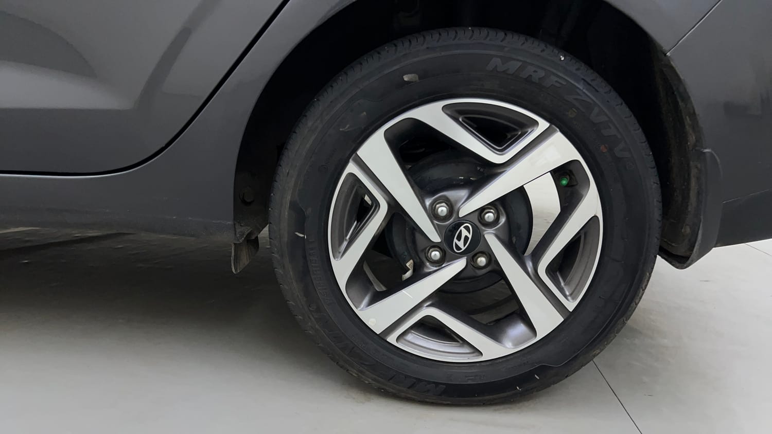 Used 2023 Hyundai Aura SX 1.2 CNG Cng Manual tyres LEFT REAR TYRE RIM VIEW