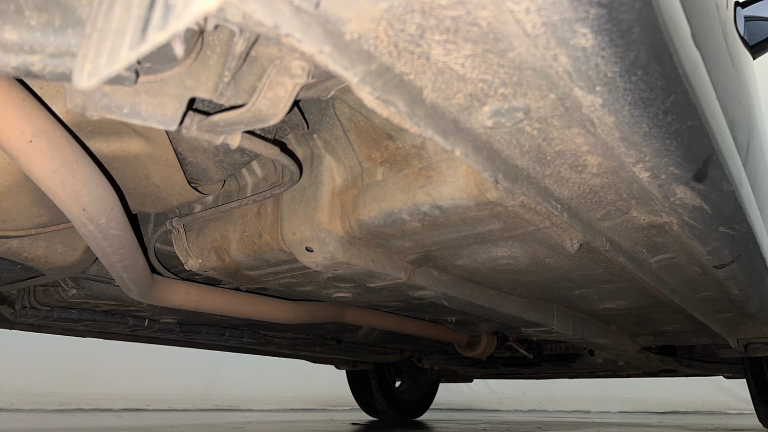 Used 2023 Hyundai Aura SX 1.2 CNG Cng Manual extra REAR RIGHT UNDERBODY VIEW