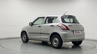 Used 2014 Maruti Suzuki Swift LXi Petrol Manual exterior LEFT REAR CORNER VIEW