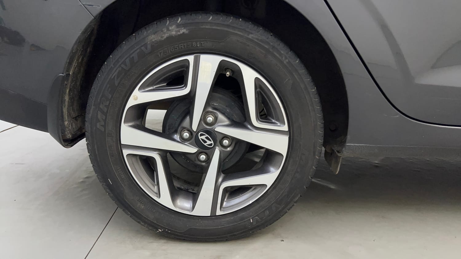 Used 2023 Hyundai Aura SX 1.2 CNG Cng Manual tyres RIGHT REAR TYRE RIM VIEW