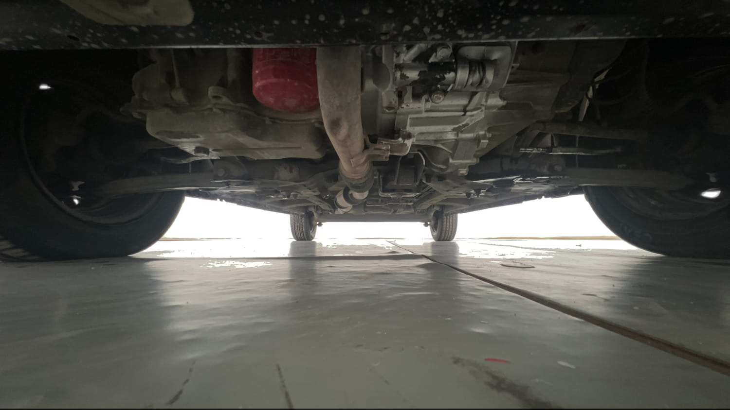 Used 2018 Mahindra KUV100 NXT K4 Plus 6 STR Petrol Manual extra FRONT LEFT UNDERBODY VIEW