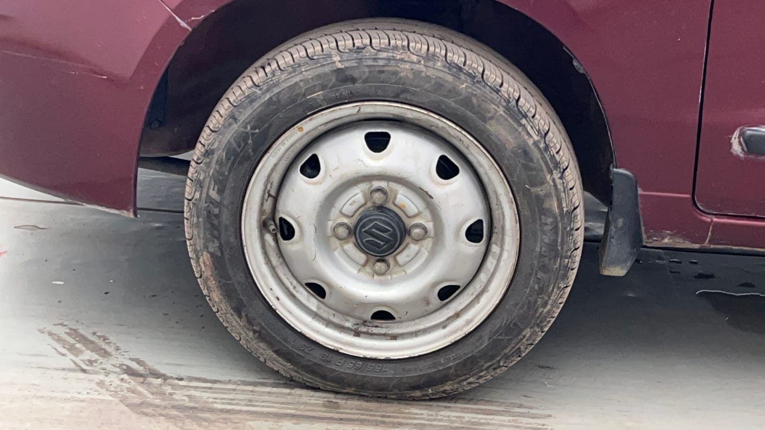 Used 2012 Maruti Suzuki Alto K10 LXi Petrol Manual tyres LEFT FRONT TYRE RIM VIEW