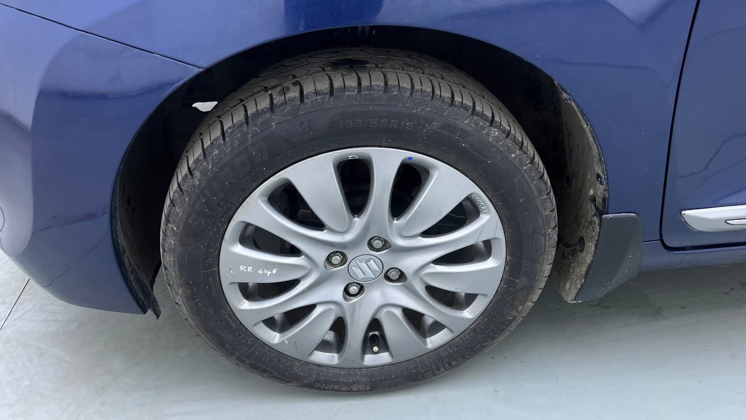 Used 2018 Maruti Suzuki Baleno Zeta 1.2 Petrol Manual tyres LEFT FRONT TYRE RIM VIEW